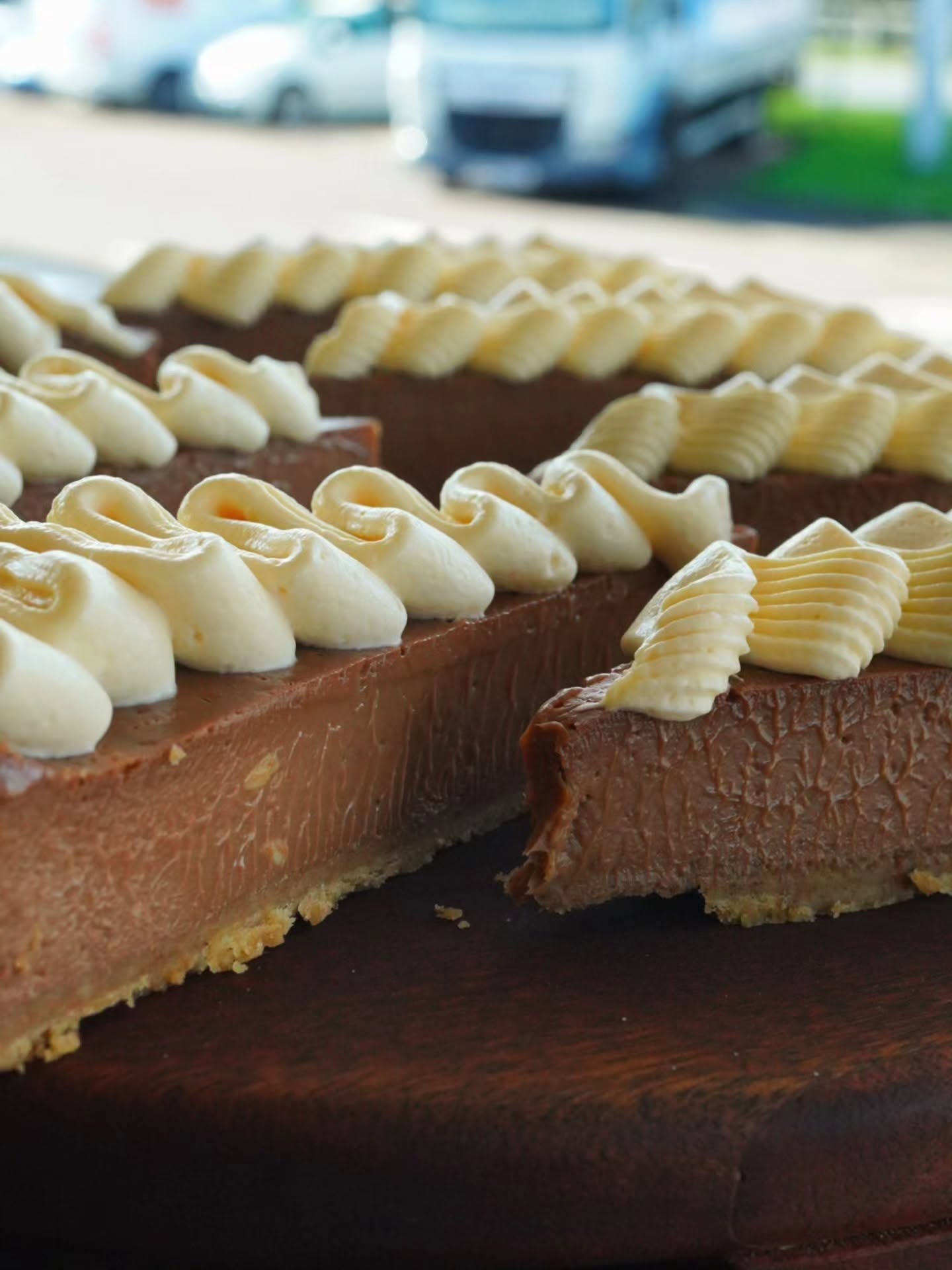 Chocolate tart topped with piped cream