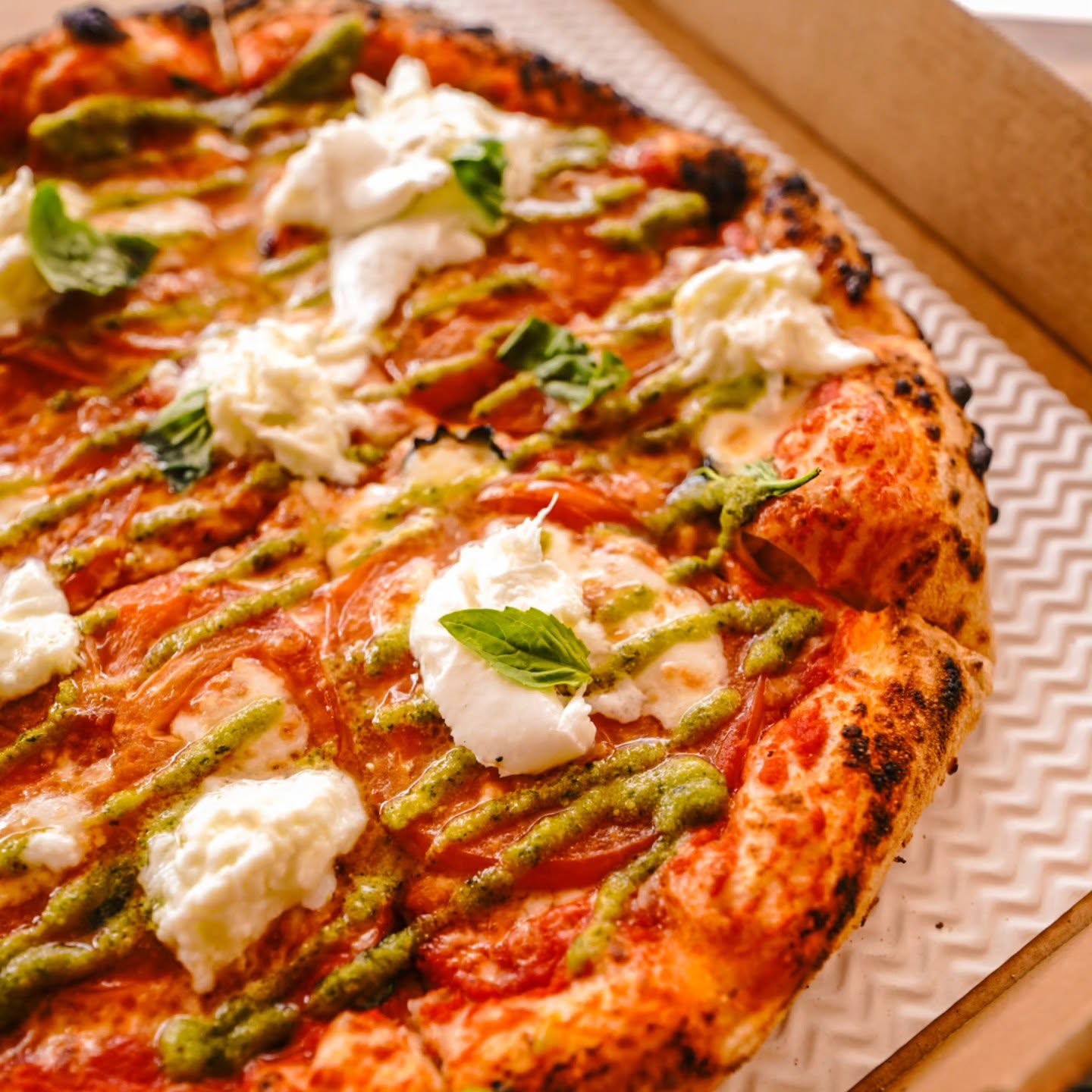 Margherita with burrata, fresh basil and pesto